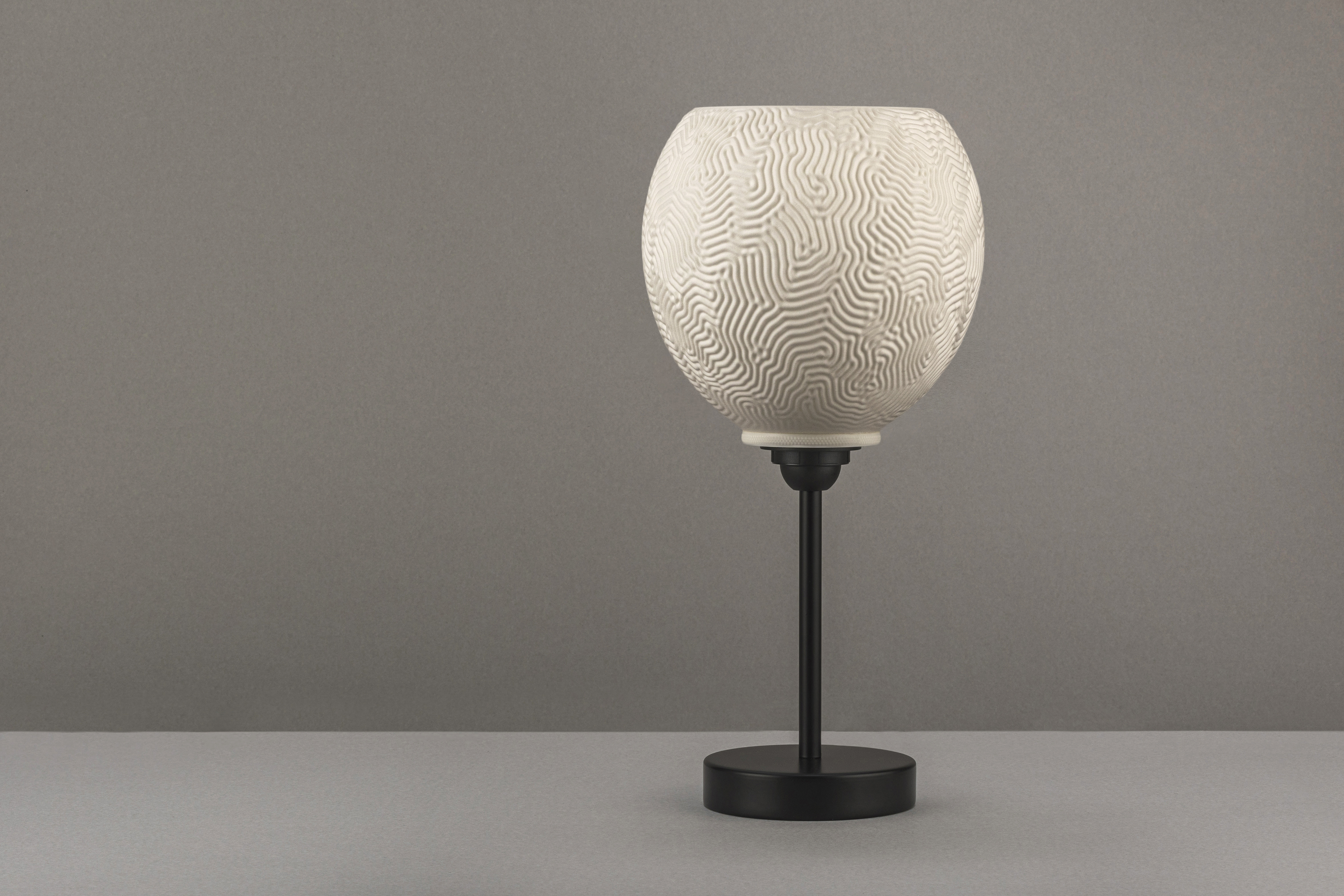 Decorative suggestion for Aeolian Plains: Pendant lampshade with a nature-inspired design. Evokes reveries of dune patterns - variant Original (Elegant white), an original product by Cosmic Jubilee (4 of 7) - presented as desktop, table, or freestanding light, switched off.