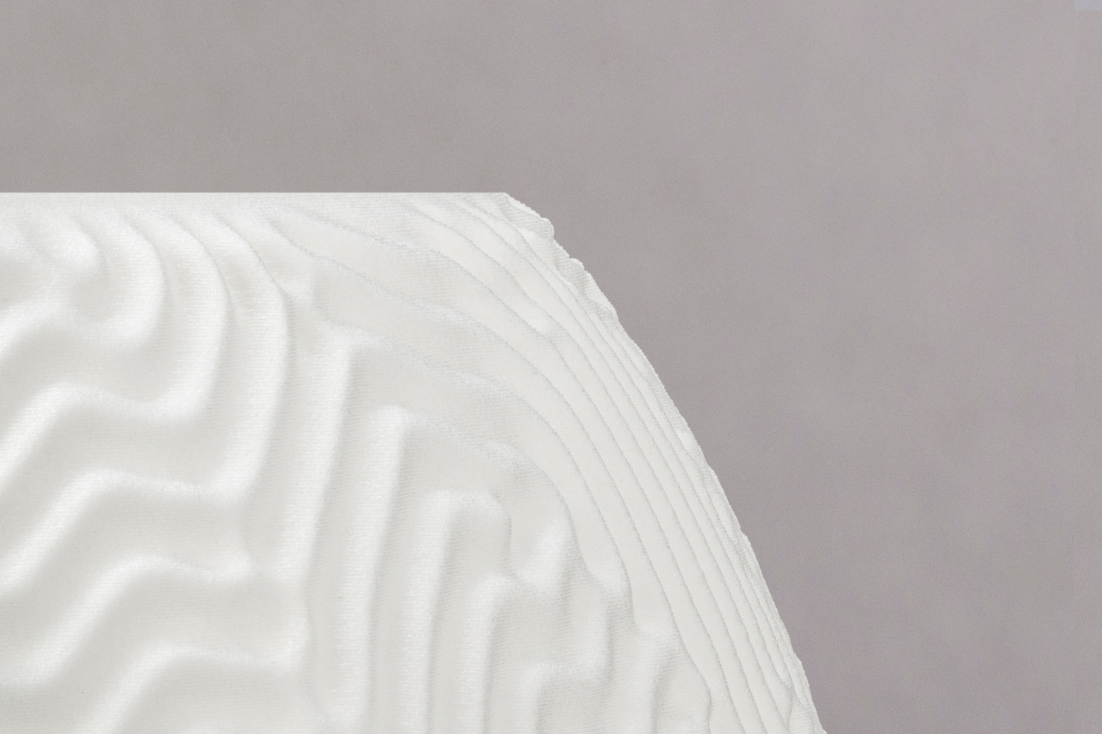 Decorative suggestion for Aeolian Plains: Tealight holder with a nature-inspired design. Evokes reveries of dune patterns - variant Original (Elegant white), an original product by Cosmic Jubilee (3 of 3) - presented as close-up details of fine textures.