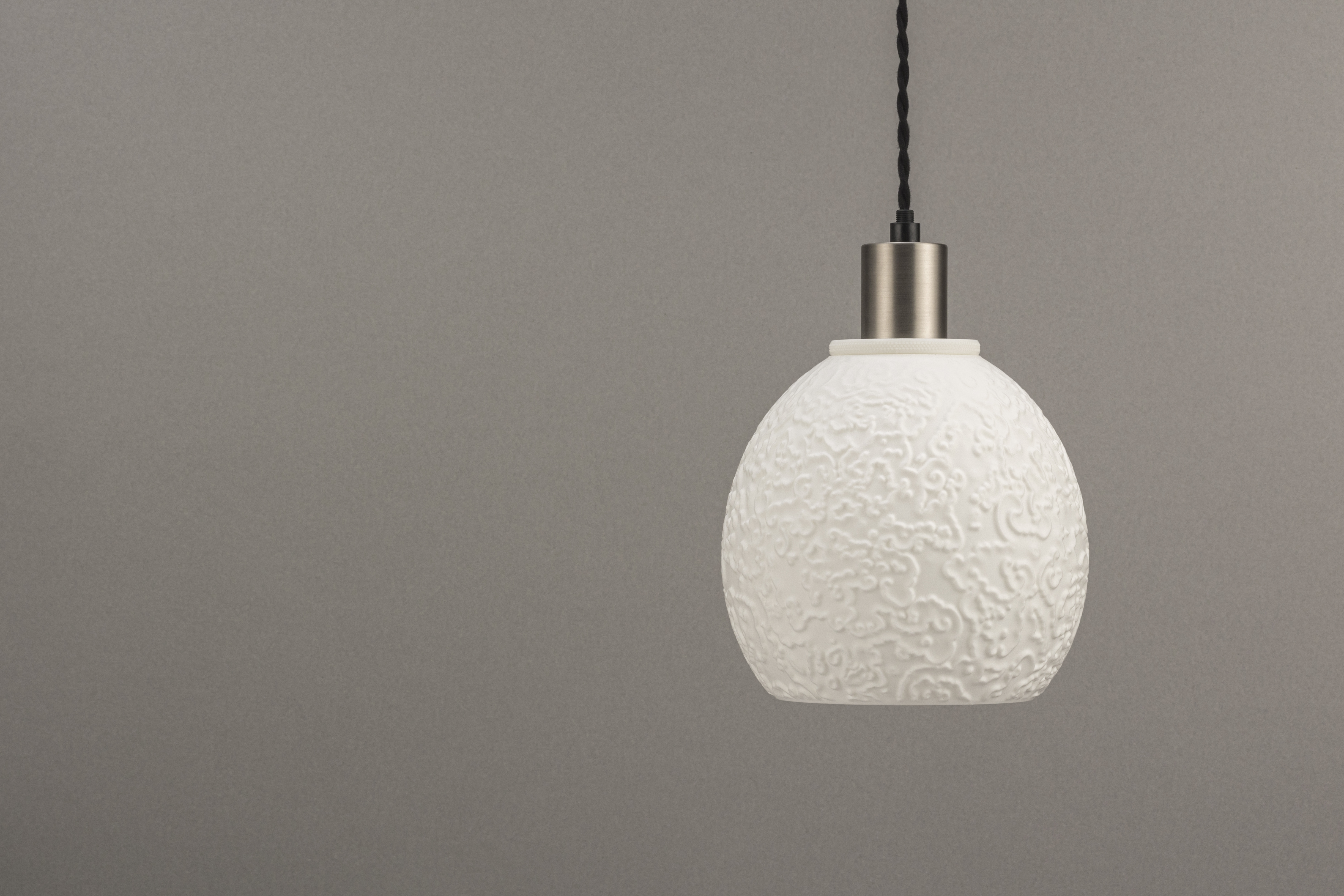 Decorative suggestion for Alluvial Crush: Pendant lampshade with captivating glyph pattern. Science and art fusion, perfect as a conversation starter - variant Original (Elegant white), an original product by Cosmic Jubilee (2 of 6) - presented as pendant light, hanging from ceiling, switched off.