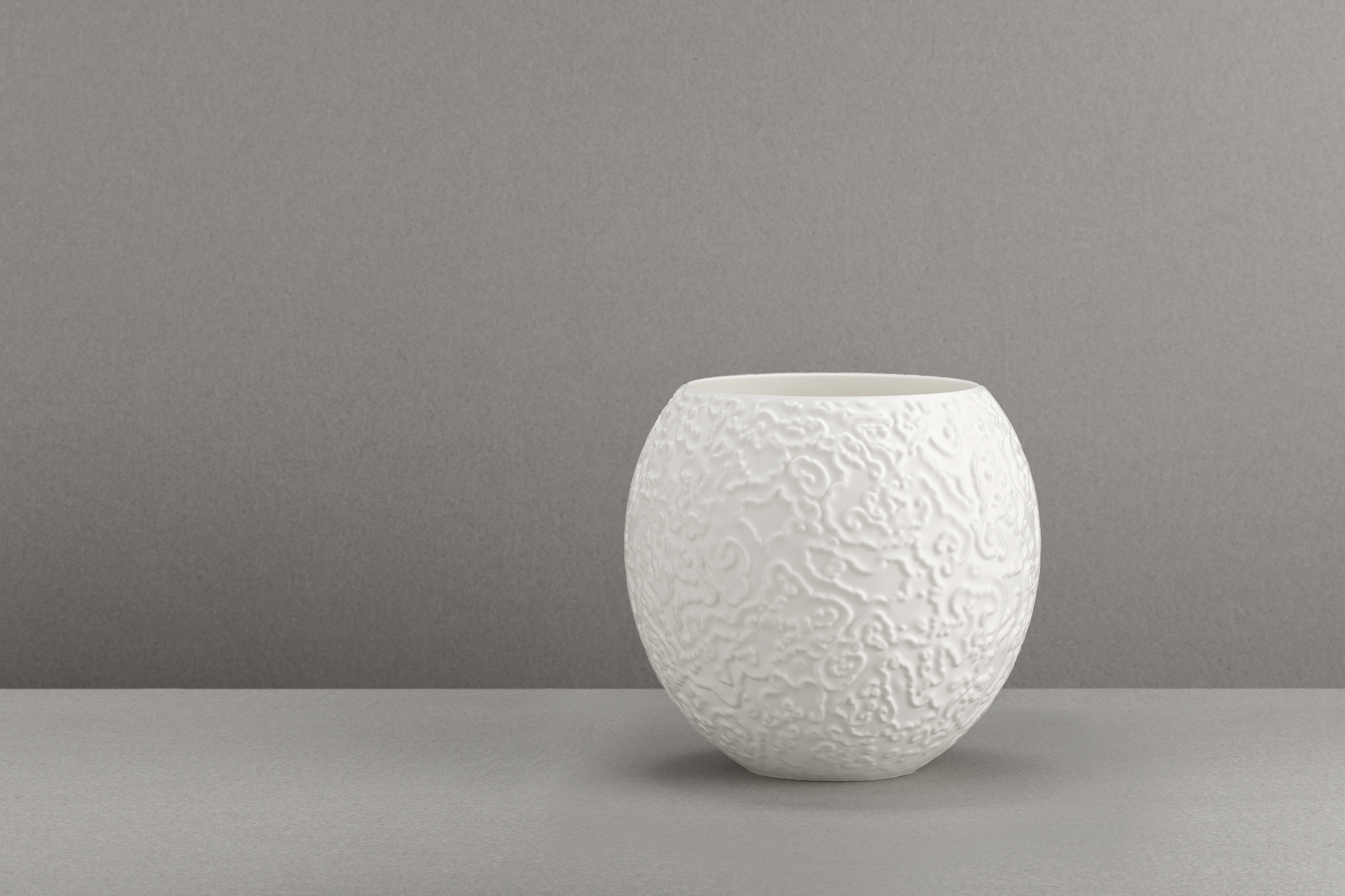 Decorative suggestion for Alluvial Crush: Pendant lampshade with captivating glyph pattern. Science and art fusion, perfect as a conversation starter - variant Original (Elegant white), an original product by Cosmic Jubilee (5 of 6) - presented as a decorative (non-water) vase or standalone showpiece.