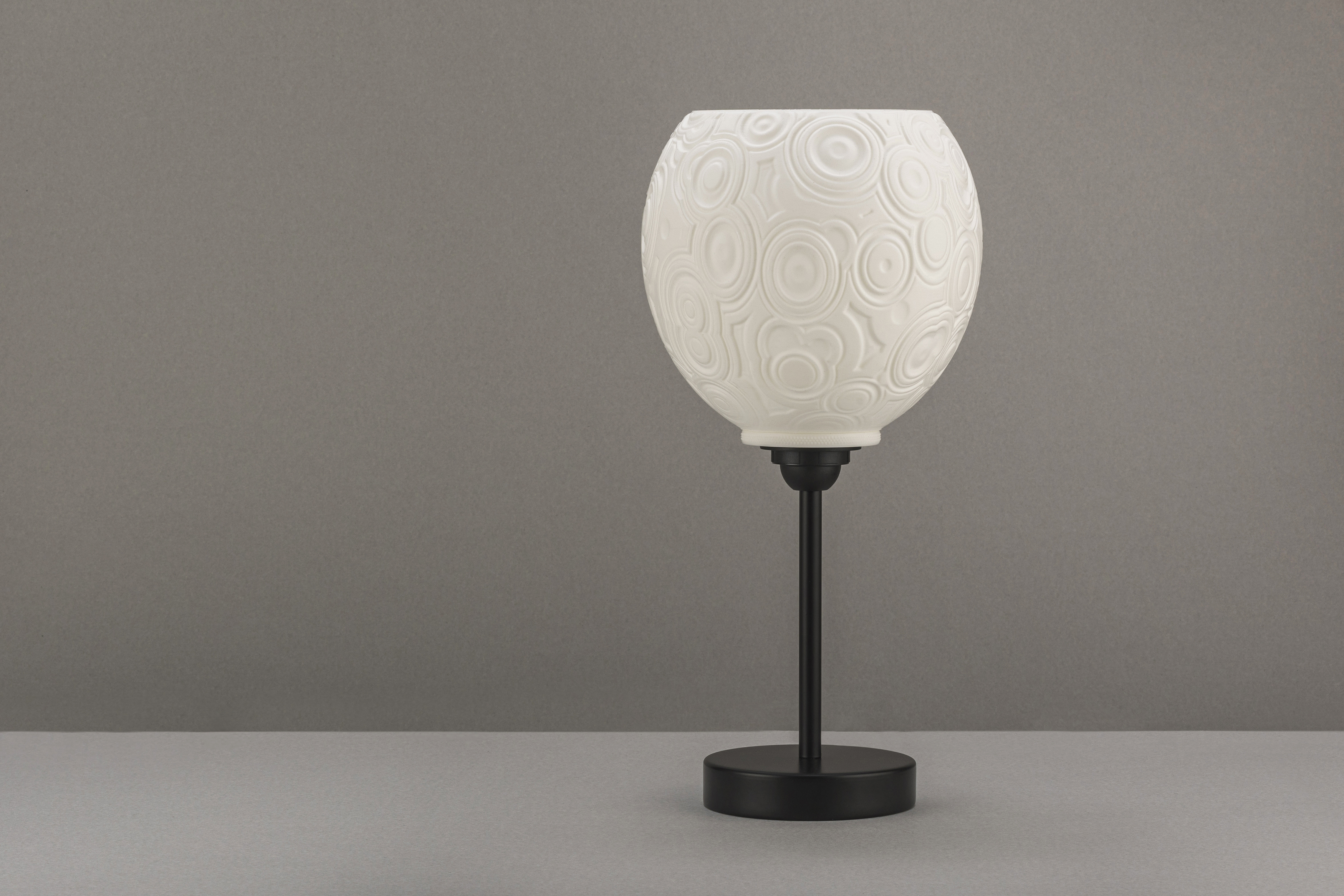 Decorative suggestion for Celestial Odyssey: Pendant lampshade with cosmic design. Perfect for stargazers and dreamers - variant Original (Elegant white), an original product by Cosmic Jubilee (4 of 6) - presented as desktop, table, or freestanding light, switched off.