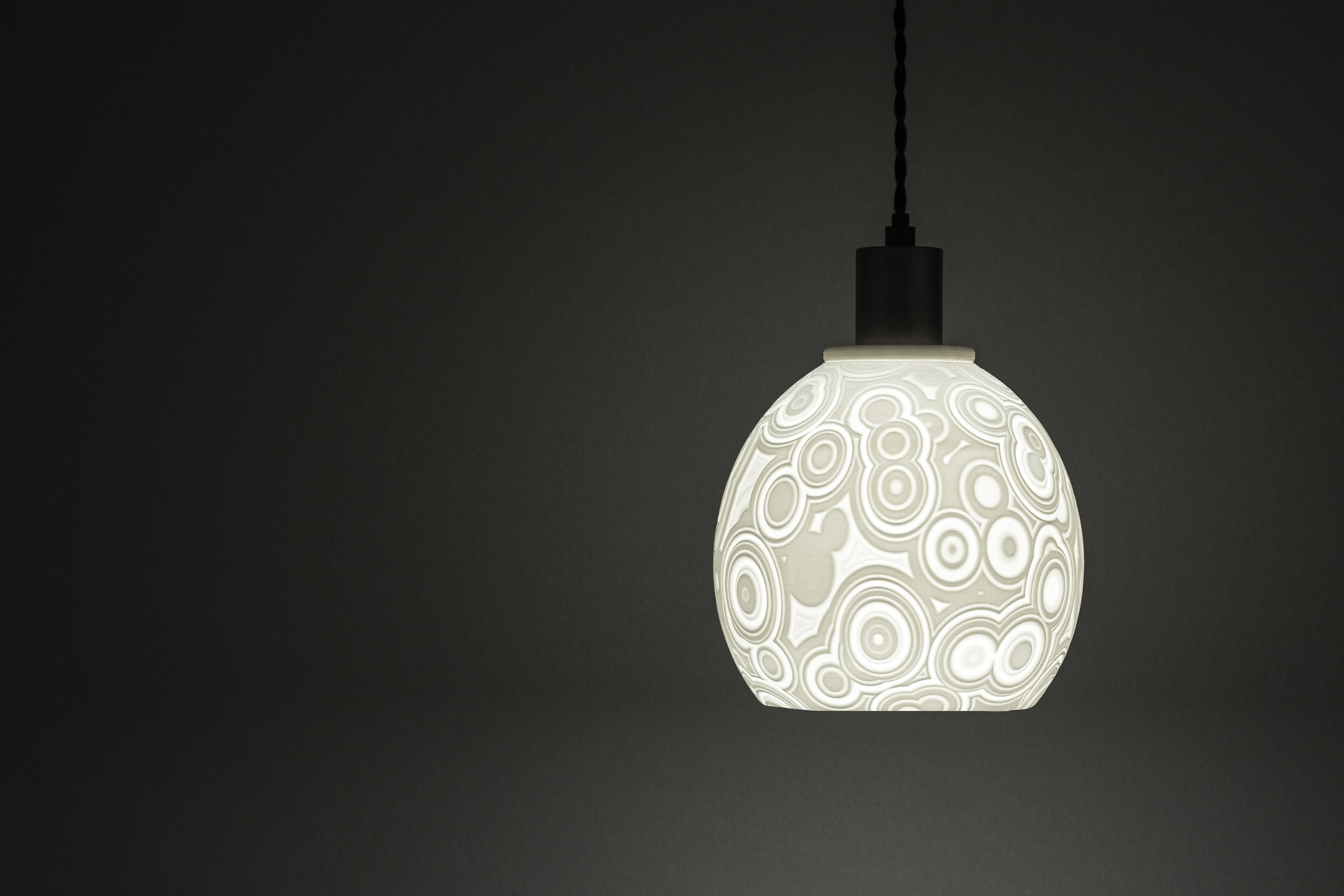 Decorative suggestion for Celestial Odyssey: Pendant lampshade with cosmic design. Perfect for stargazers and dreamers - variant Original (Elegant white), an original product by Cosmic Jubilee (1 of 6) - presented as pendant light, hanging from ceiling, switched on.