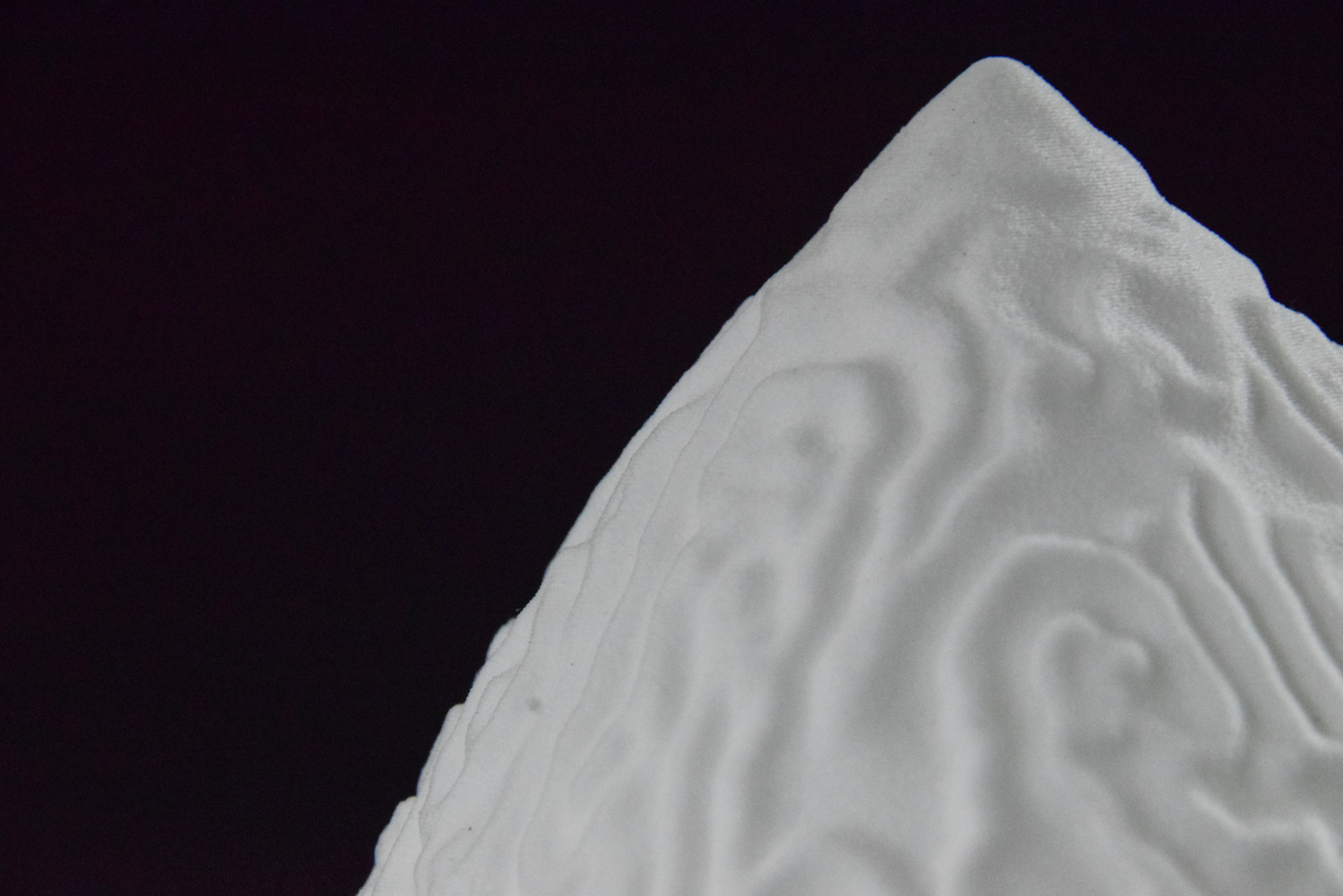 Decorative suggestion for Cosmic Drop: Desktop light with cosmic design. Encapsulates the beauty of the cosmos - variant Alluvial Crush (Elegant white), an original product by Cosmic Jubilee (5 of 5) - presented as close-up details of fine textures.