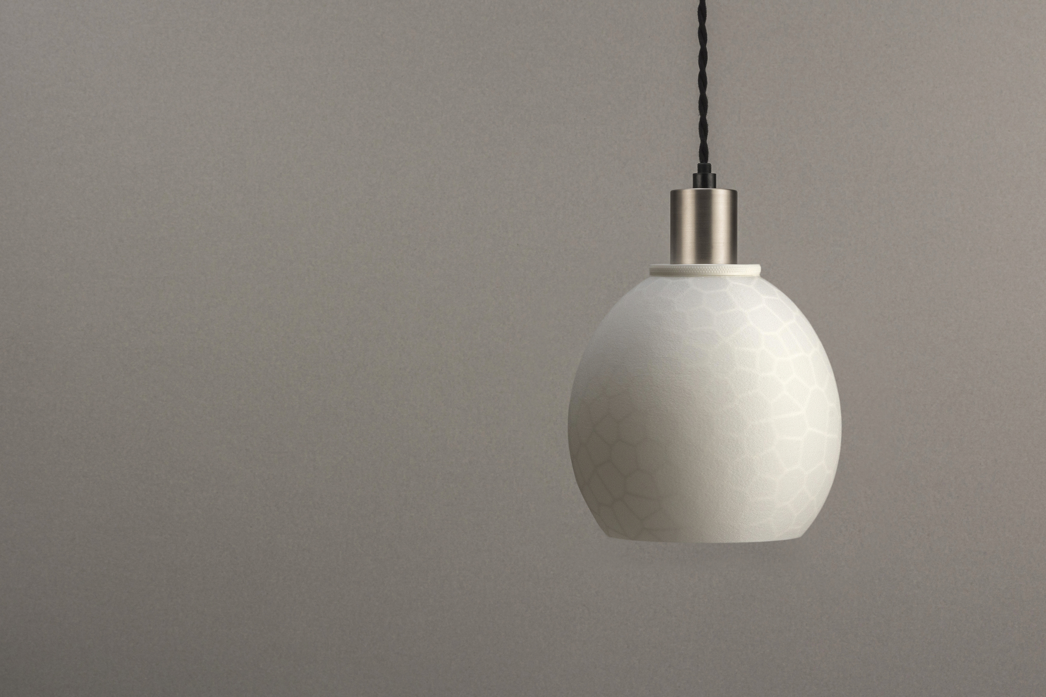Decorative suggestion for Furtive Shroud: Pendant lampshade with a hidden organic pattern, revealed only when lit. Witness light transform the ordinary to exceptional - variant Original (Elegant white), an original product by Cosmic Jubilee (2 of 7) - presented as pendant light, hanging from ceiling, switched off.