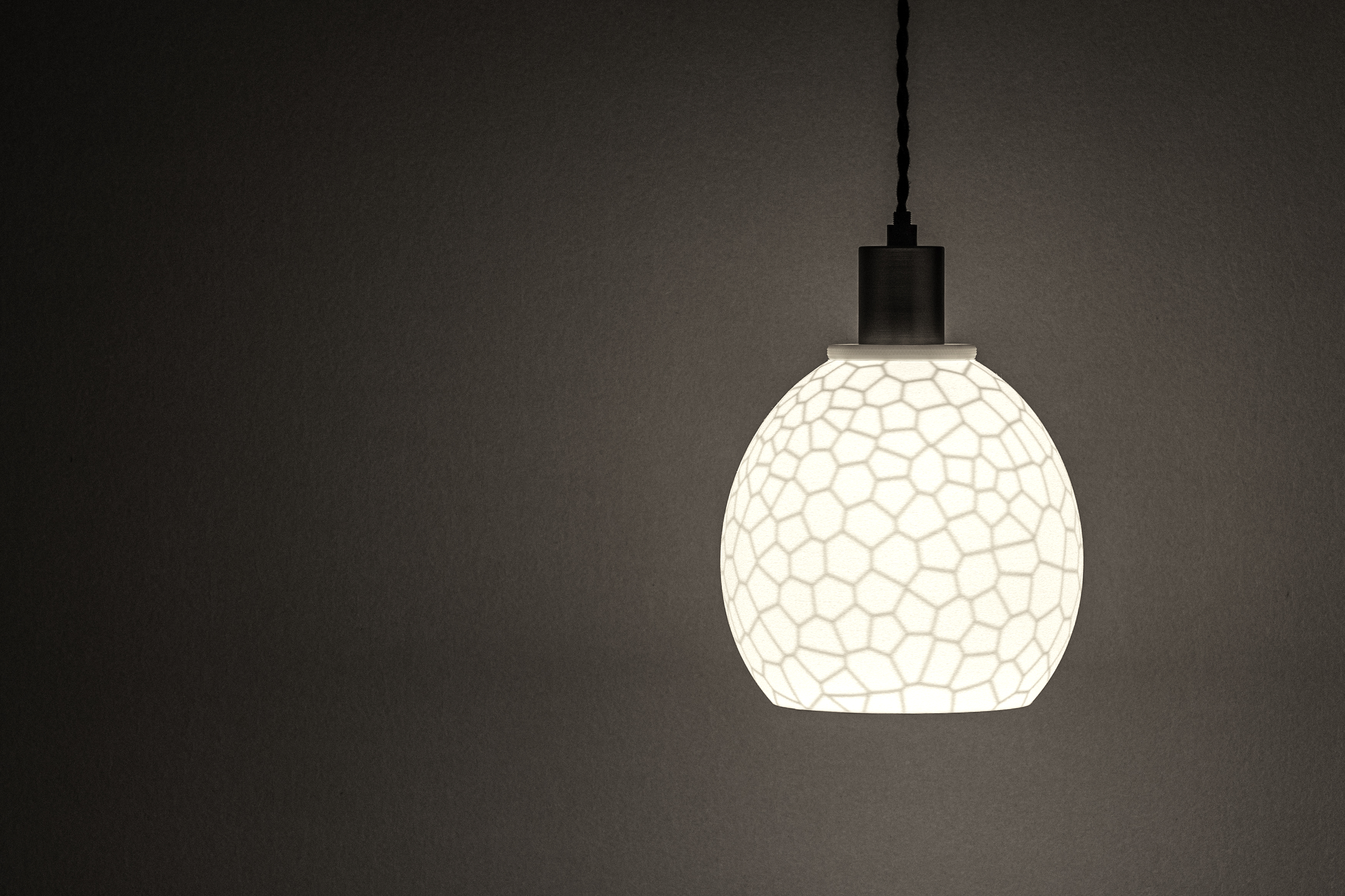 Decorative suggestion for Furtive Shroud: Pendant lampshade with a hidden organic pattern, revealed only when lit. Witness light transform the ordinary to exceptional - variant Original (Elegant white), an original product by Cosmic Jubilee (1 of 7) - presented as pendant light, hanging from ceiling, switched on.