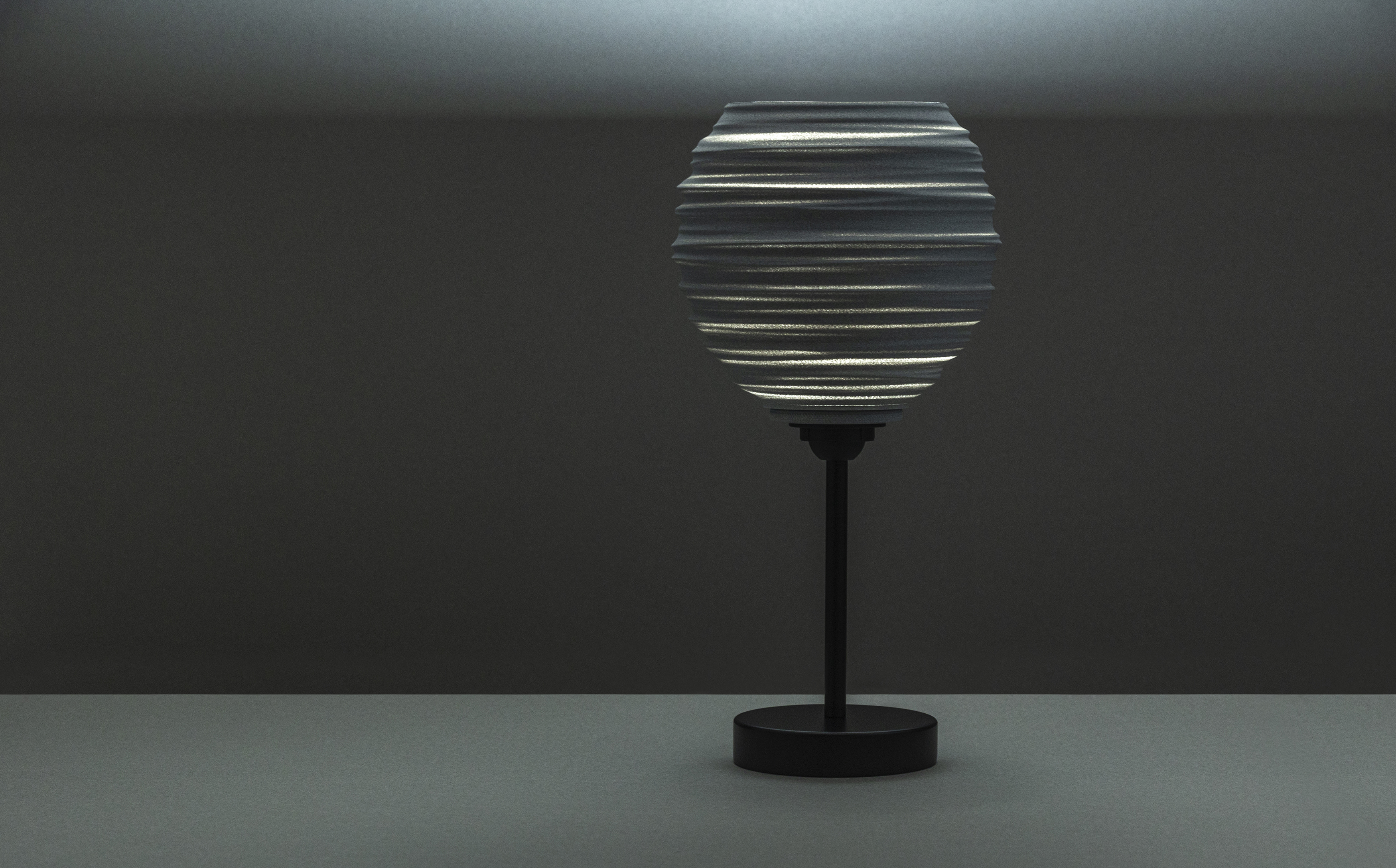 Decorative suggestion for Magma Shroud: Pendant lampshade mirroring tumultuous magma flow. Adds an elemental touch to modern decor - variant Granite Gray (Grainy textured stone gray spotlight), an original product by Cosmic Jubilee (3 of 6) - presented as desktop, table, or freestanding light, switched on.