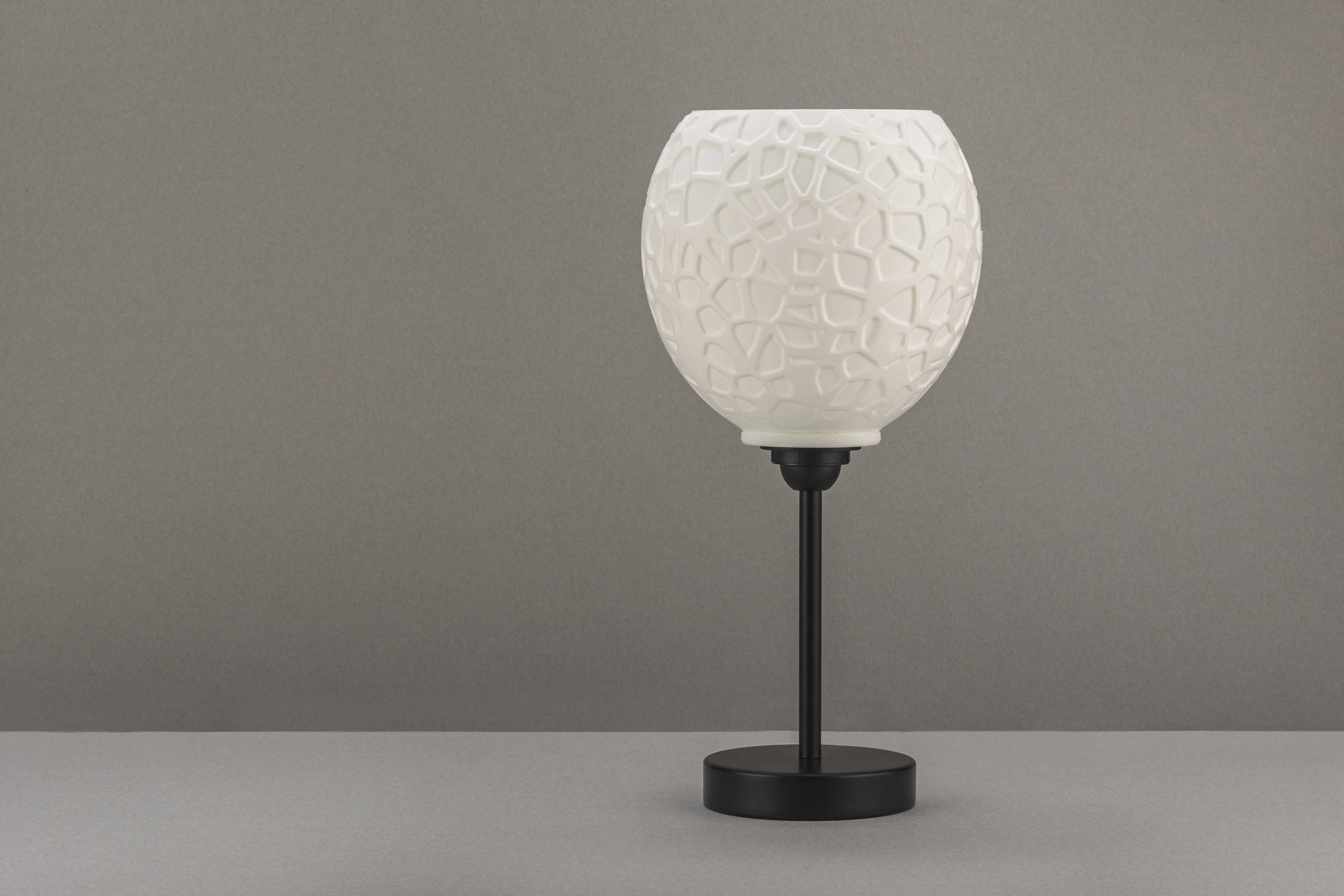 Decorative suggestion for Petrified Shallows: Pendant lampshade with timeless Voronoi design. Ideal for adding depth and history to your space - variant Original (Elegant white), an original product by Cosmic Jubilee (4 of 6) - presented as desktop, table, or freestanding light, switched off.