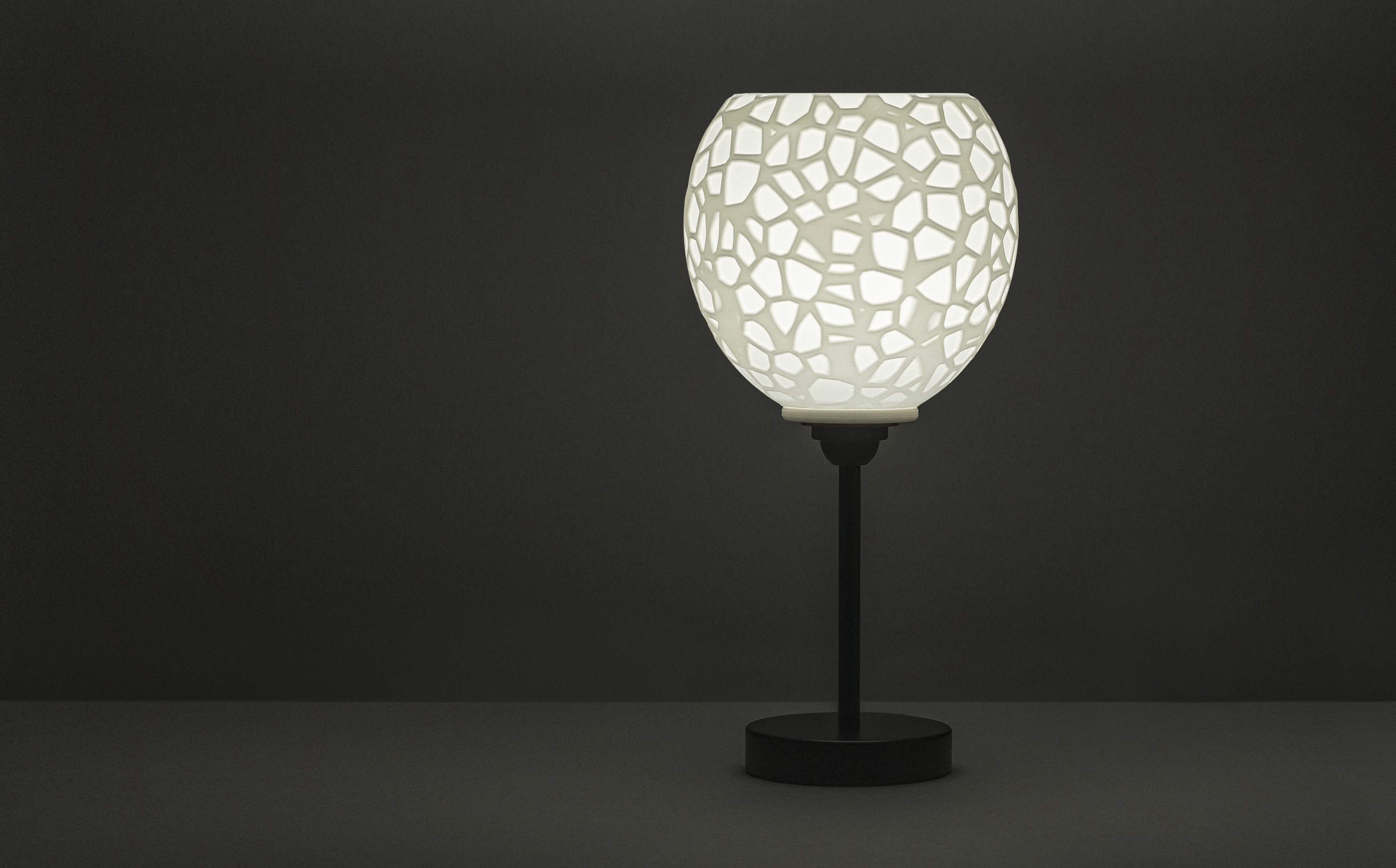 Decorative suggestion for Petrified Shallows: Pendant lampshade with timeless Voronoi design. Ideal for adding depth and history to your space - variant Original (Elegant white), an original product by Cosmic Jubilee (3 of 6) - presented as desktop, table, or freestanding light, switched on.